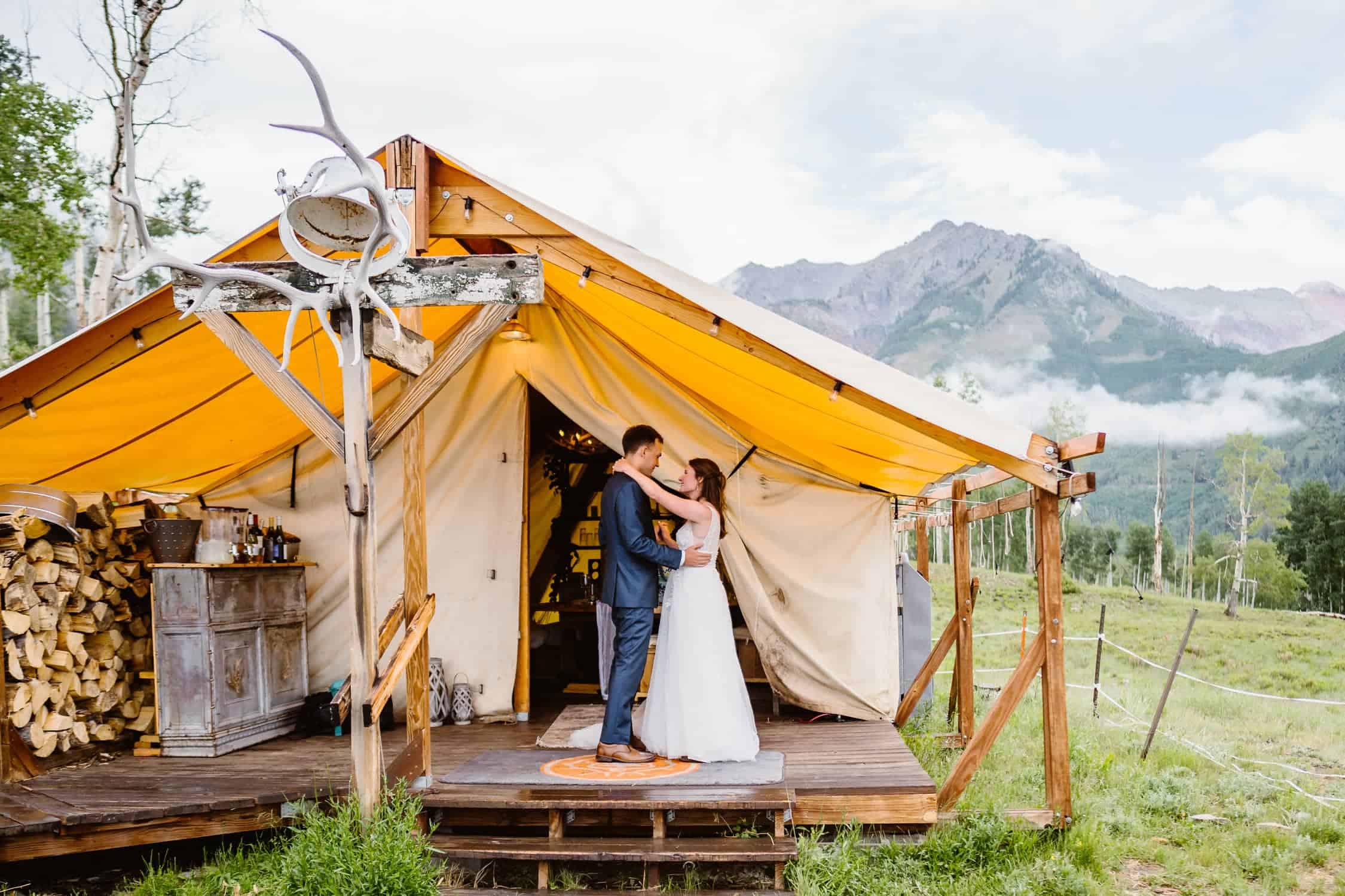 A couple sharing a first dance on their wedding day at Telluride Sleighs and Wagons.