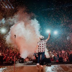 Bruno Mars entertaining a crowd on stage