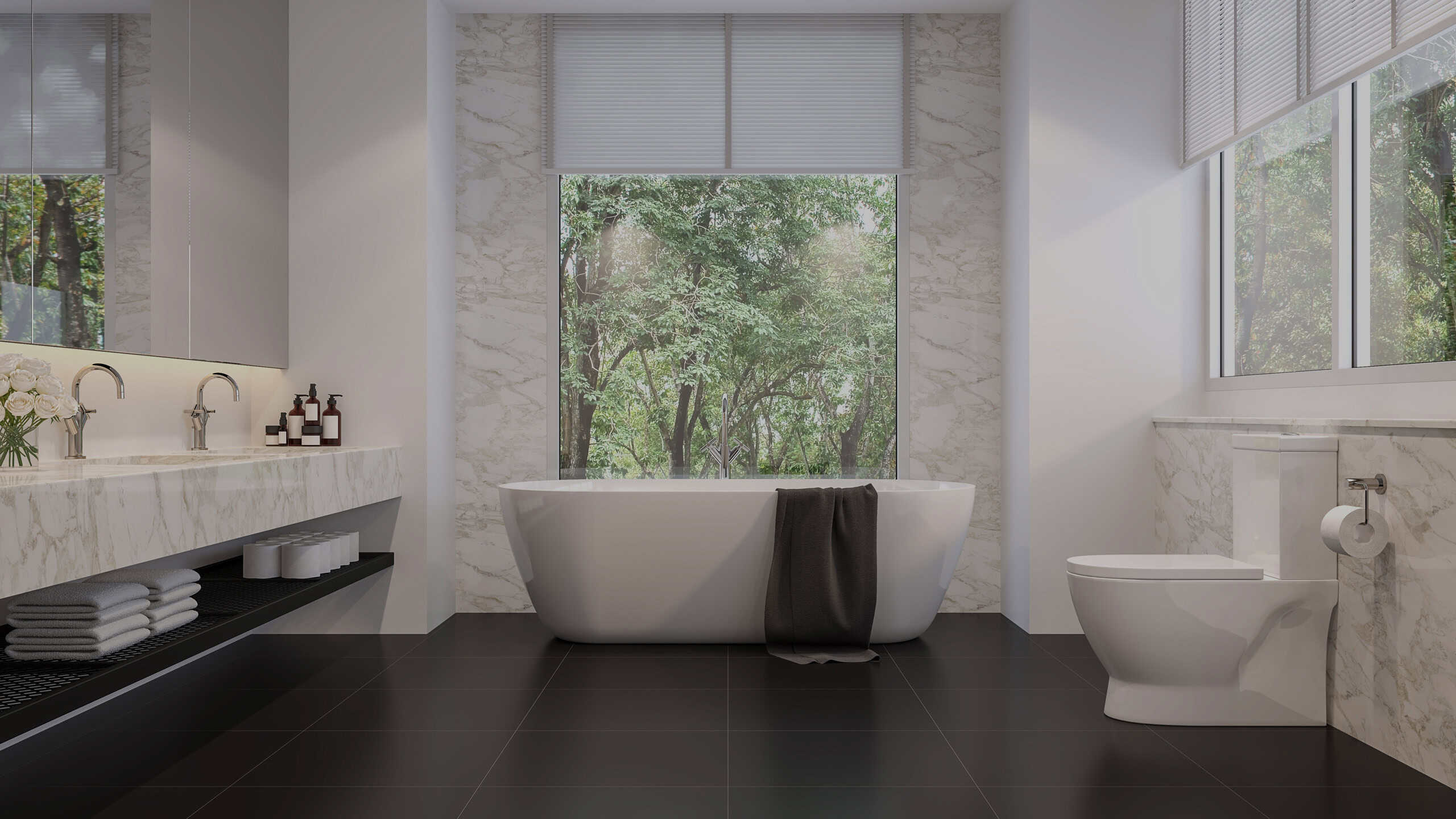 Luxurious bathroom with toilet and marble walls and benchtop