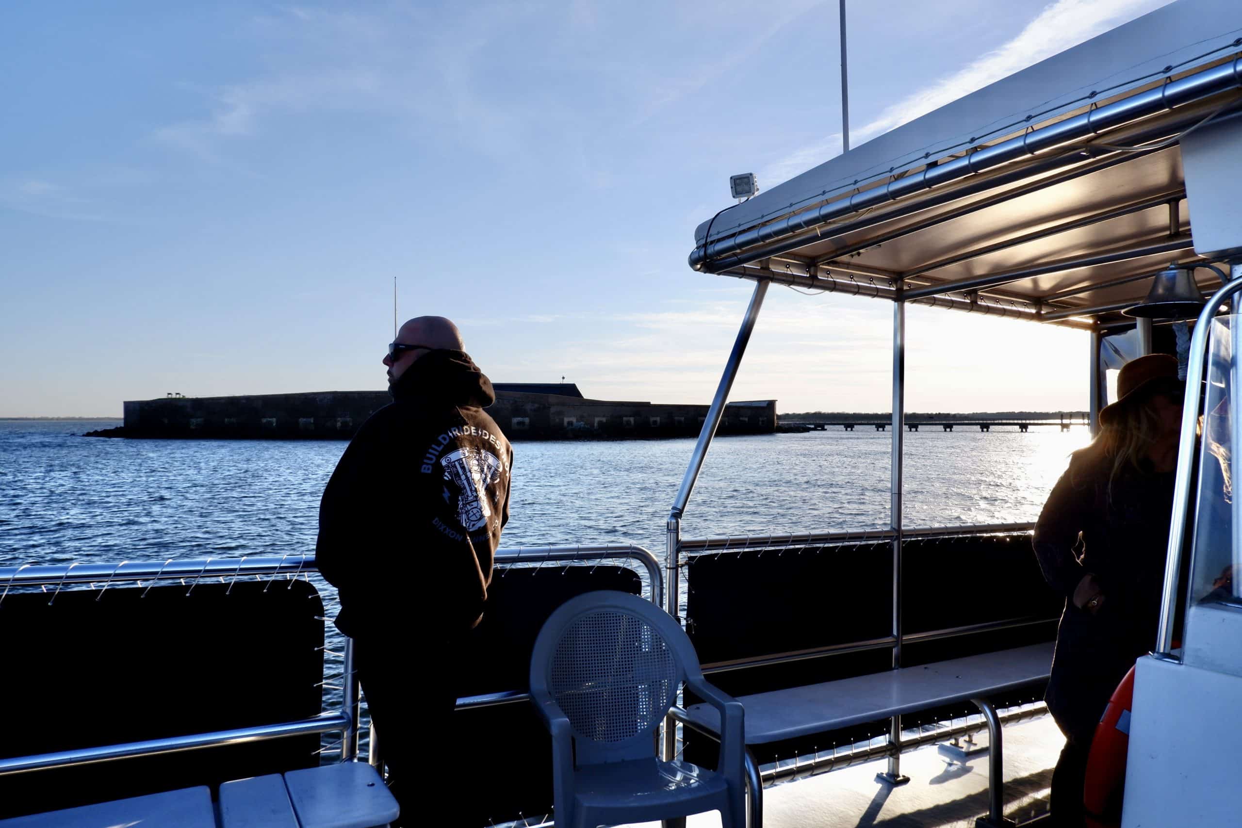 Man enjoying the view of Fort Sumter. Private charter Charleston, SC