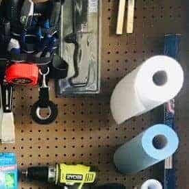 Organize tools on a pegboard: paper towels