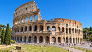 Colosseum in Rome under a clear blue sky