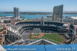 Stunning high-angle view of Petco Park overlooking the baseball field with the San Diego Bay and city skyline in the background.