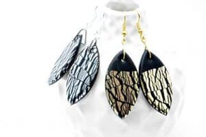 Glamouröse Ohrringe mit schwarzen Anhängern