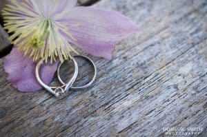 Close-up photograph of Hazelz engagement and wedding rings