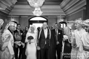 Bride and Groom arrive at the Hilton Hotel