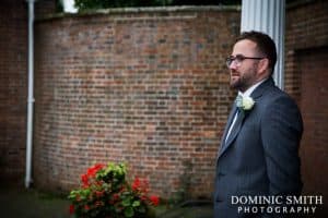 Groomsman outside East Court