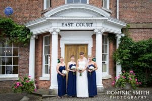 Tracey with the bridal party outside East Court