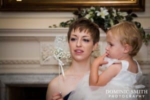 Bridesmaid and Flowergirl waiting at East Court