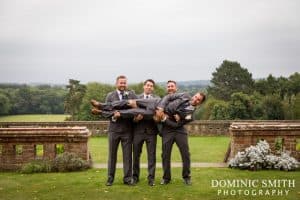 Groomsmen posing at East Court