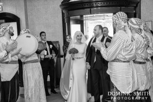 Bride and Groom arrive at the Hilton Hotel