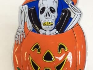 Plastic Skeleton over Pumpkin Cutout