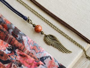 Wechselschmuck mit Flügel und Schaumkoralle