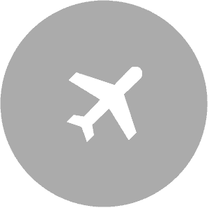Airplane icon in gray circle, long distance moving and relocation services symbol