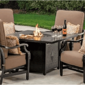 Beige cushioned patio chairs around square fire pit