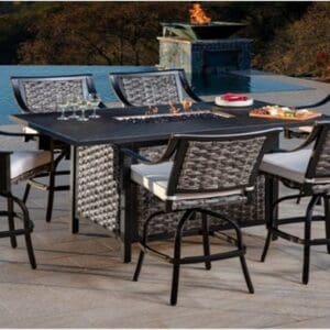 Outdoor patio dining set with six chairs and a gas grill on a spacious patio.