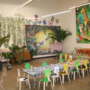 Colorful kids' classroom decorated with jungle and animal themes.
