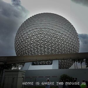 View of Spaceship Earth as runners enter Epcot