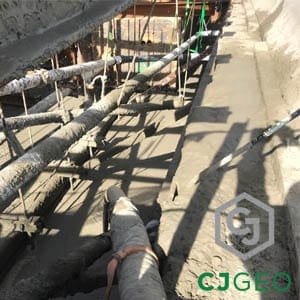 Cellular concrete backfill around utility duct banks over pedestrian tunnel.