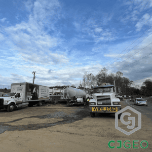 Mobilization of CJGeo's dry batch cellular grouting plant for the Paw Creek sewer abandonment project in Charlotte.