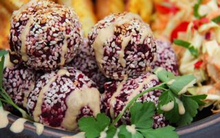 Vegan beet balls with nuts, almonds, pumpkin seed and beetroot
