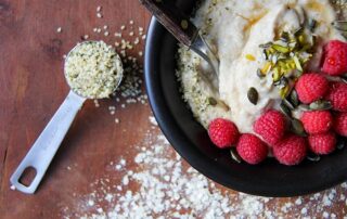 Gluten-free vegan quinoa flake porridge recipe with hemp seed and dates