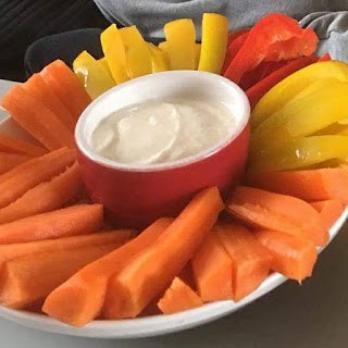 Dip surrounded by crudites