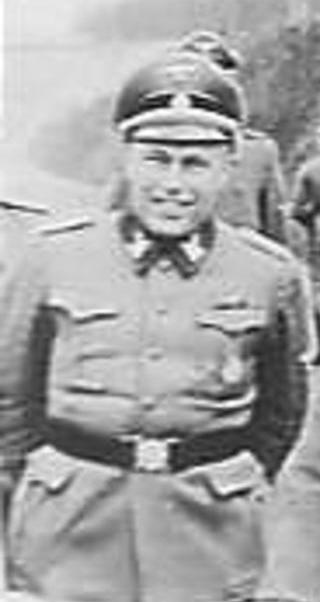 Portret van Wilhelm Harster, Duitse jurist en SS-politiefunctionaris, actief in Nederland en Italië tijdens de Tweede Wereldoorlog.