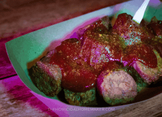 Grilled sausage with a spicy, curry ketchup inspired by the horror movie Baghead