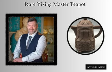 Walter O'Neill standing beside rare Yixing teapot discovered at a South Wales car boot sale