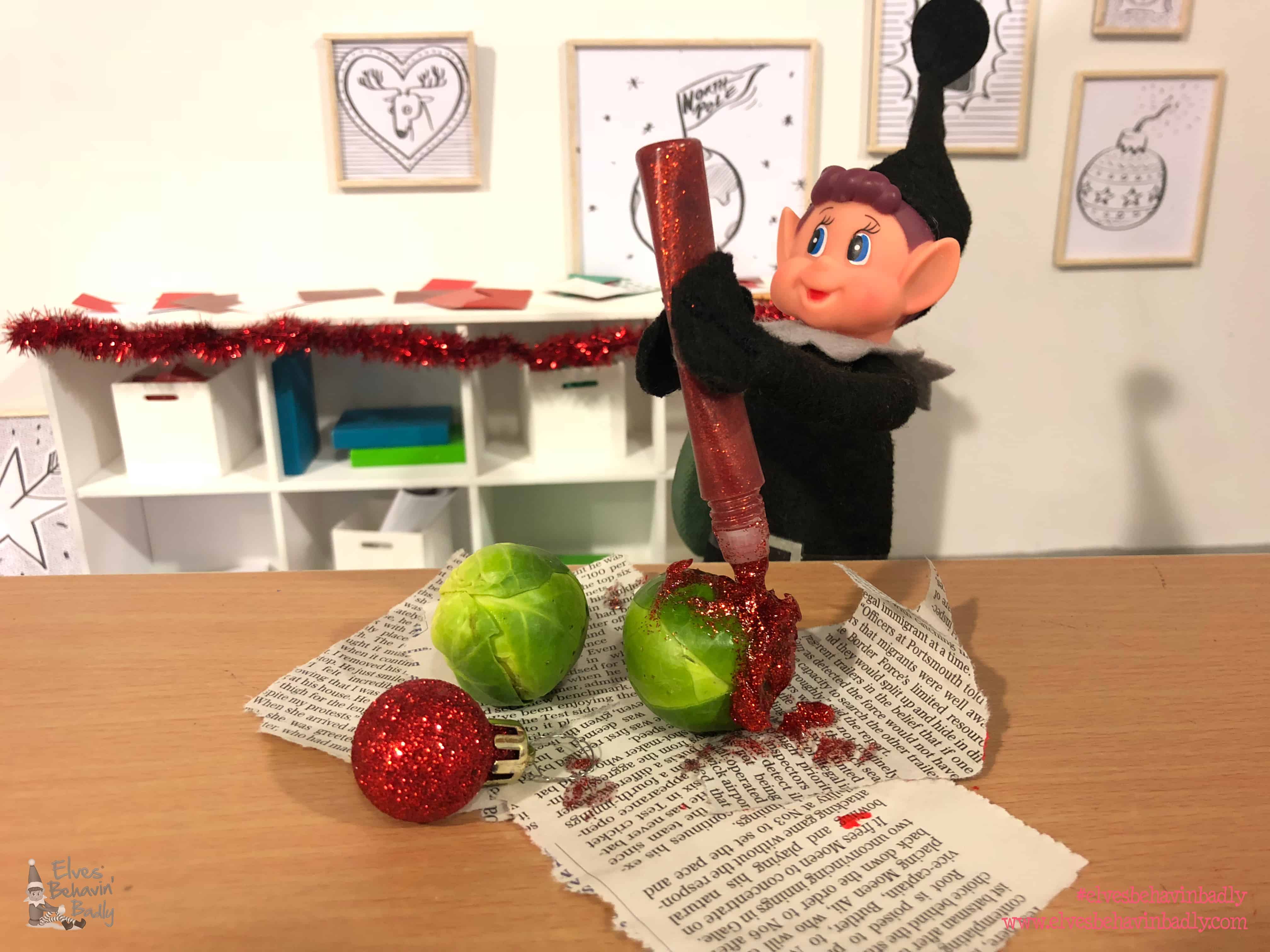 elf putting glitter onto a sprout!