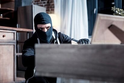 Theif robbing home
