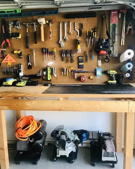 Organize your garage with a simple DIY workbench made from 2x4s. 