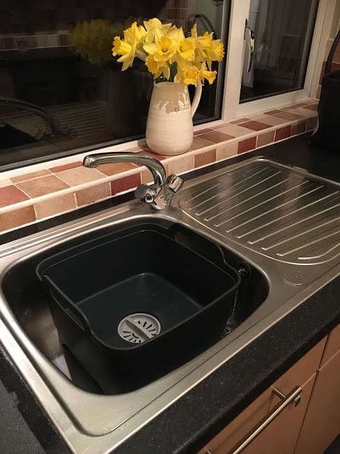 Clean tidy sink area in a kitchen