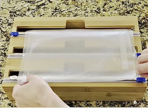 Organize Plastic Wrap, Foil and Wax Paper in a Bamboo Drawer Organizer