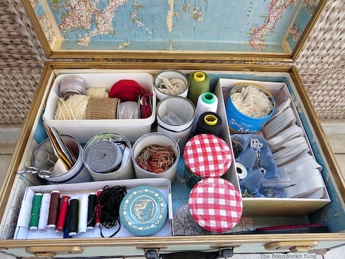 organize sewing supplies: repurpose an old trunk or suitcase into a sewing station.