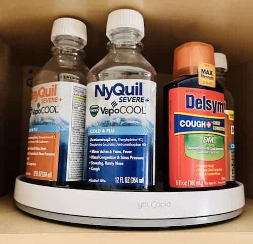 Medicine bottles stored on a Lazy Susan turntable