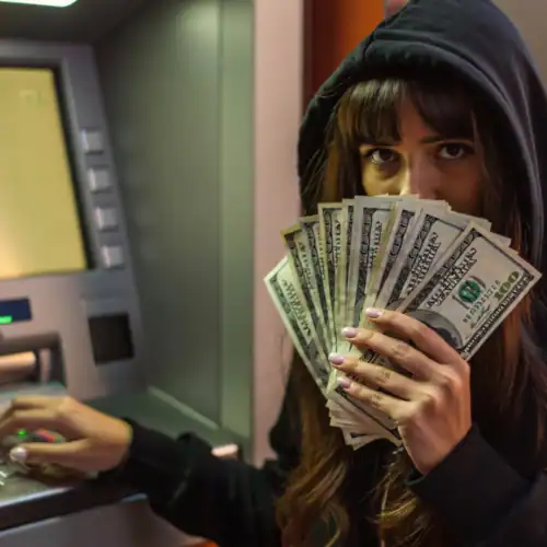 Someone is draining my mother’s bank account—what can I do?