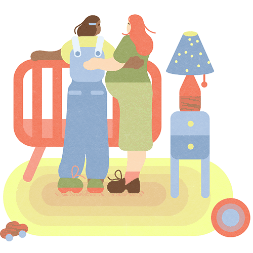 Pregnant couple looking at crib