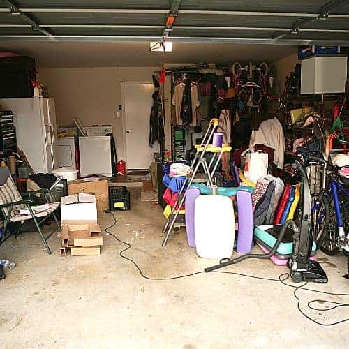 Declutter your garage by sorting like items together to be stored more efficiently.