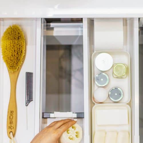 Organize bathroom drawers in zones to save time