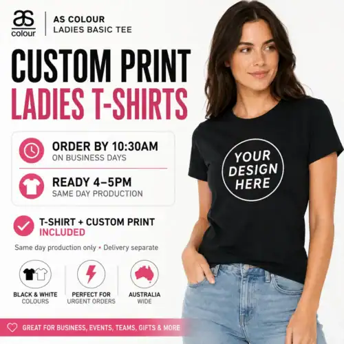 Woman wearing a black AS Colour ladies basic tee with a custom front print, representing custom printed women’s T-shirts available in Australia.
