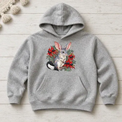 Grey marle Bilby Among Sturt Desert Peas kids hoodie laid flat on whitewashed timber boards