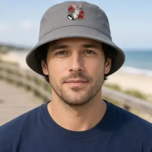 Lifestyle photo of the Bilby Among Sturt Desert Peas Bucket Hat being worn or used
