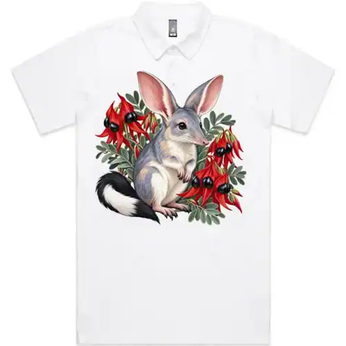 White polo shirt printed on the front with a bilby among red Sturt desert peas
