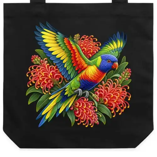 Black cotton tote bag printed with a rainbow lorikeet among red grevillea