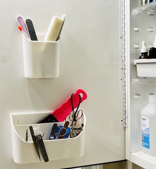 Organize a messy room: use magnetic bins on the inside of the medicine cabinet