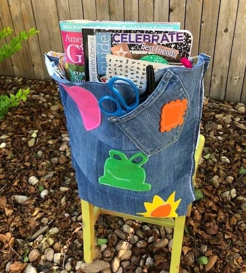 Colored Pencil Storage Ideas: Sew a chair pocket from recycled jeans.