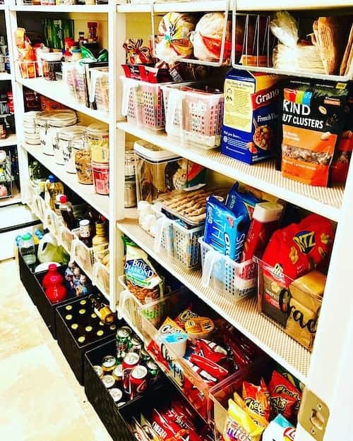 Organize baking supplies in a pantry by establishing a baking zone.