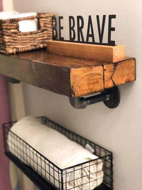 Small bathroom organizing hacks: DIY wood pipe shelf